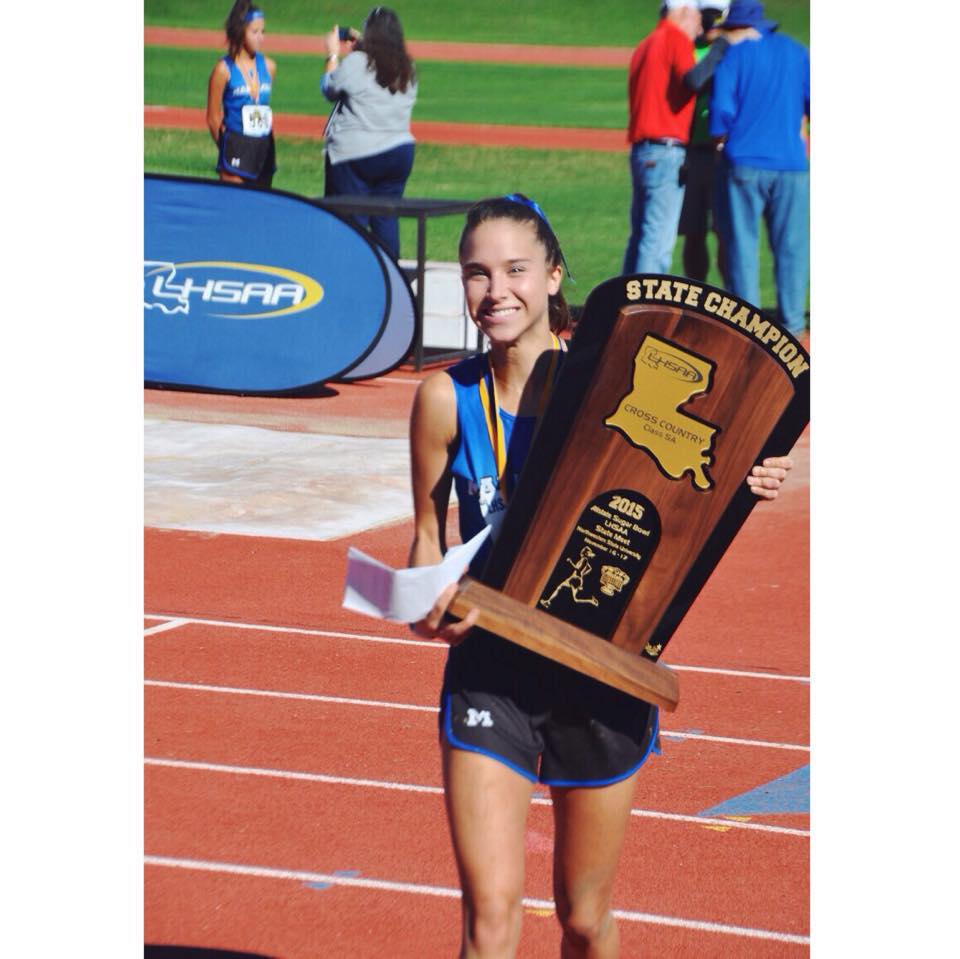 Claire winning State Championship Trophy.jpg