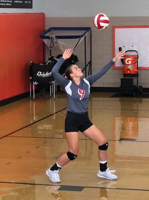 Anita playing volleyball.jpg