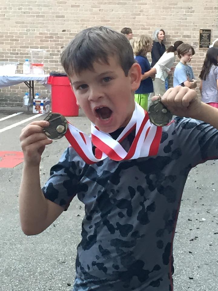 Dennis winning ribbons.jpg